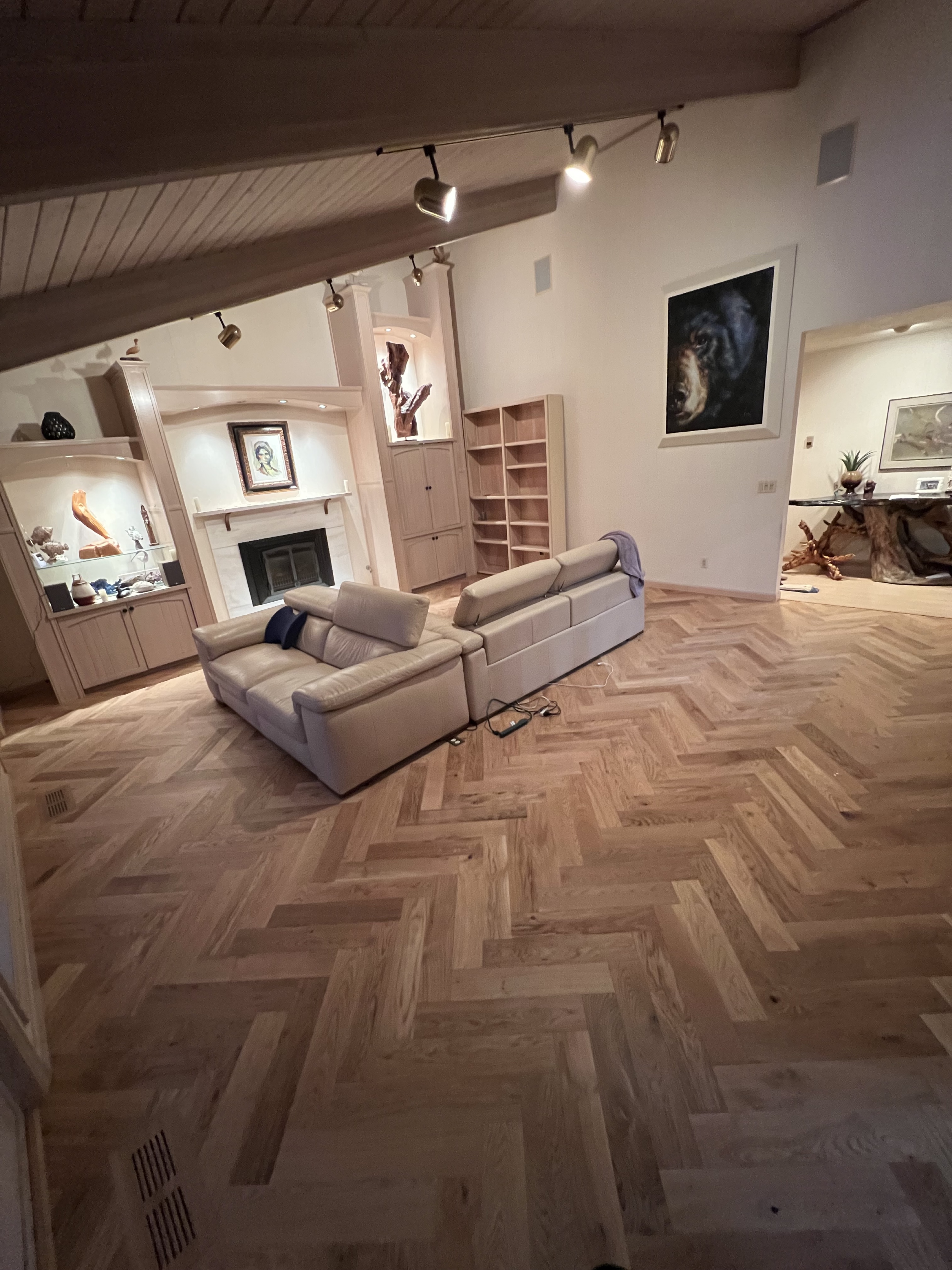 Living room with herringbone hardwood floor