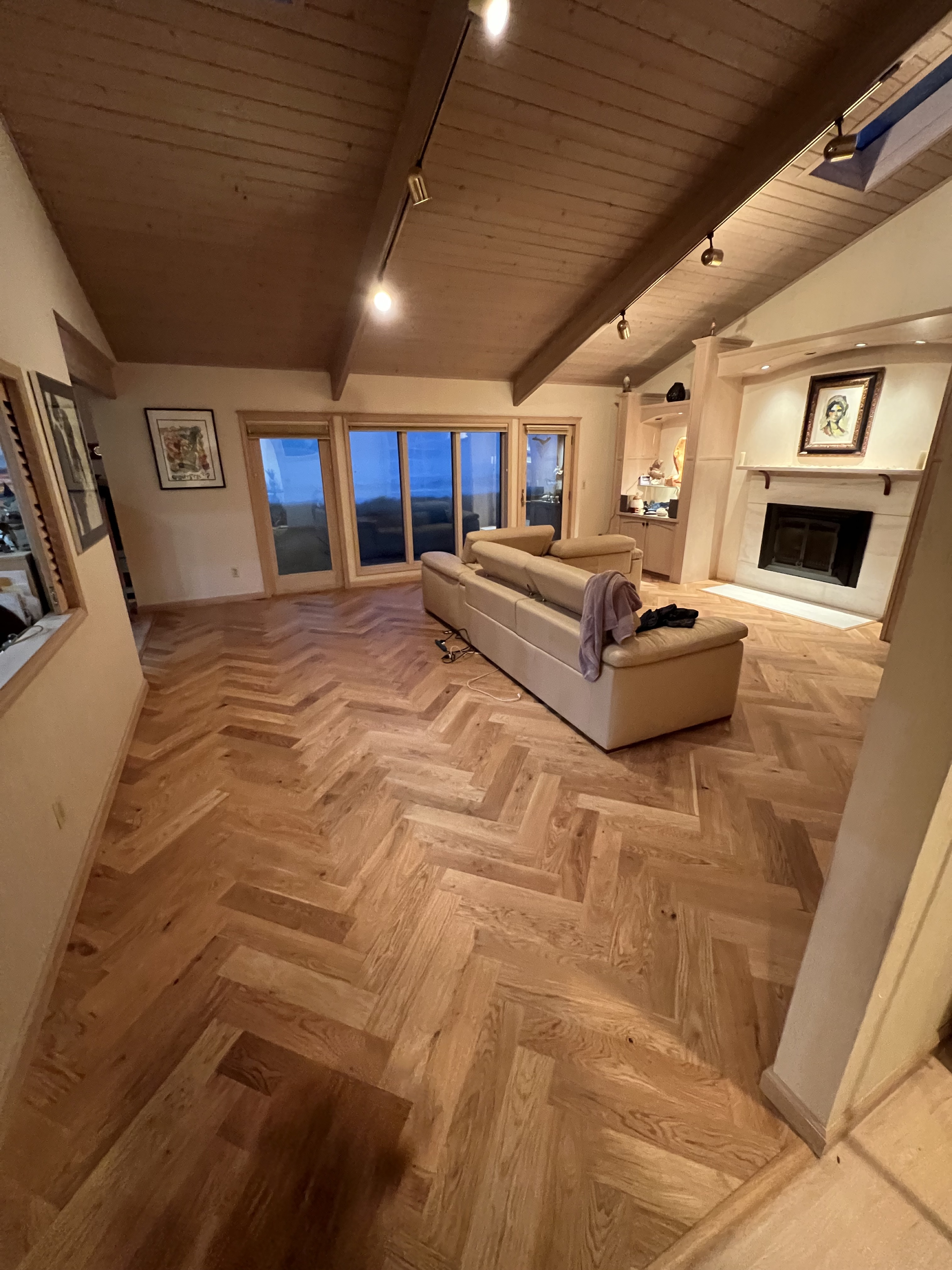 Wide view of herringbone floor across the room